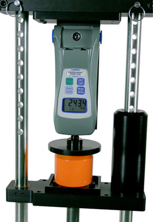 Shimpo FGS-1000H Manual Test Stand being used with a force gauge