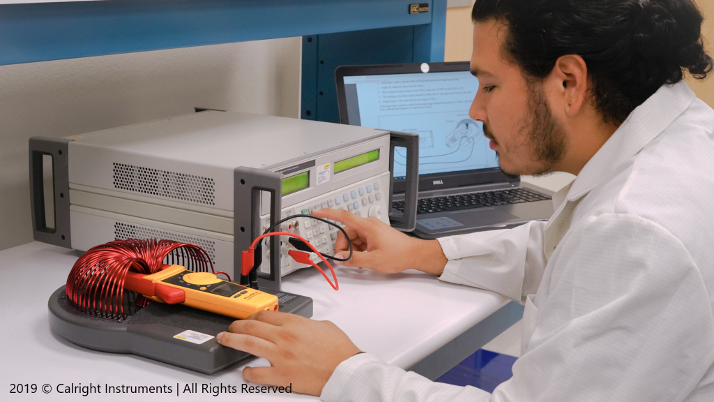 Technician calibrating a clamp on meter